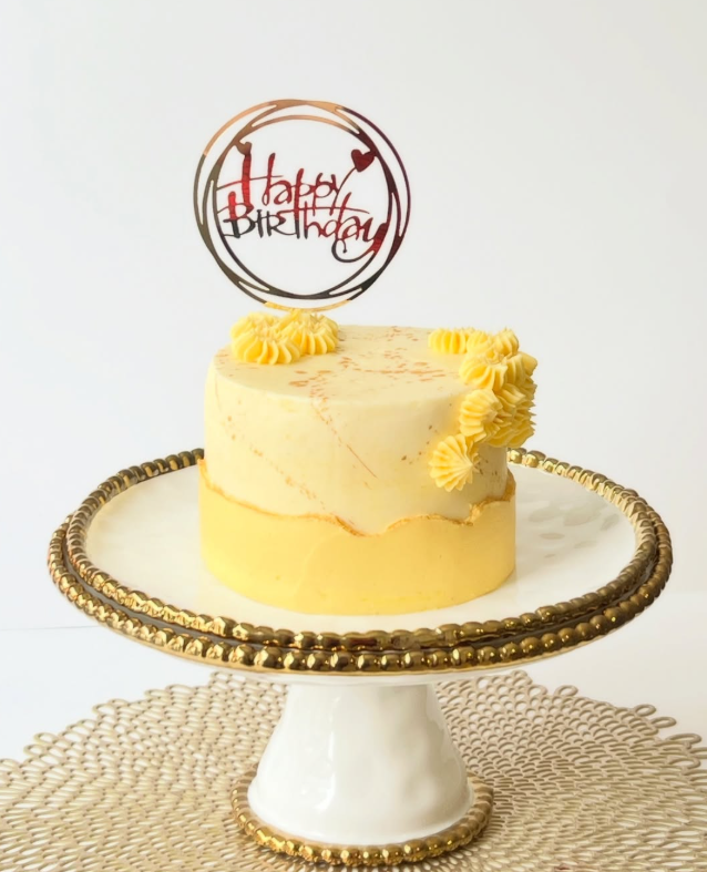 Pikachu-themed custom birthday cake made with Confetti sponge cake and Vanilla Swiss meringue buttercream and a red and white