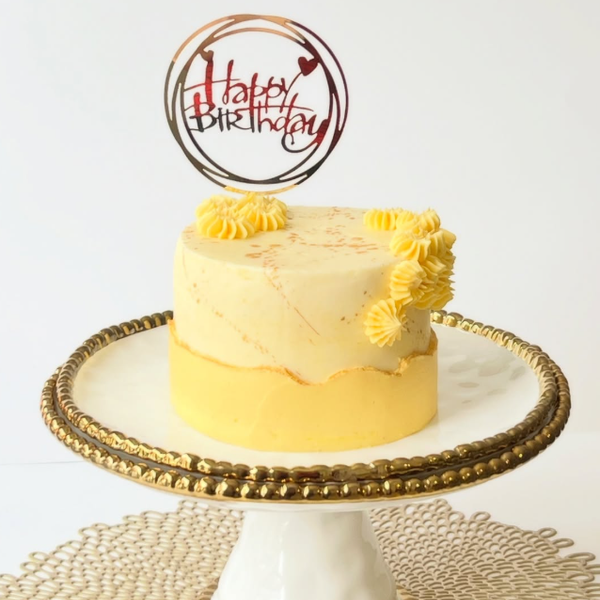 Pikachu-themed custom birthday cake made with Confetti sponge cake and Vanilla Swiss meringue buttercream and a red and white